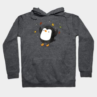 Penguin having fun with autumn leaves Hoodie